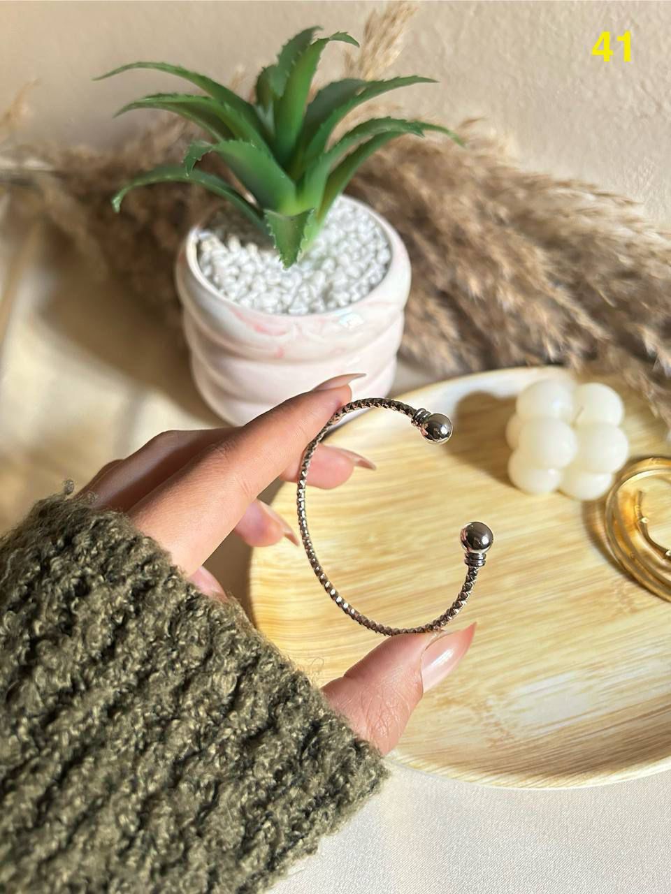 Rust-resistant silver-plated copper bracelet.